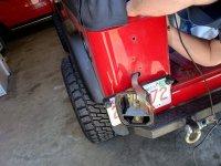 big hole in jeep.jpg