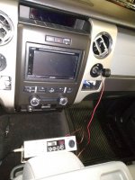 Truck CB closed cup holders to access cubby hole.jpg